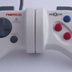 Image for article titled This Weird Driving Controller Had Force Feedback Before Steering Wheels